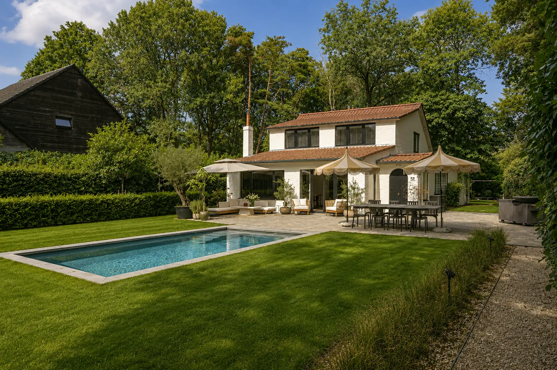 Stijlvolle villa waar mediterrane charme en hedendaags buitenleven harmonieus samenkomen op een toplocatie in Heide foto 2