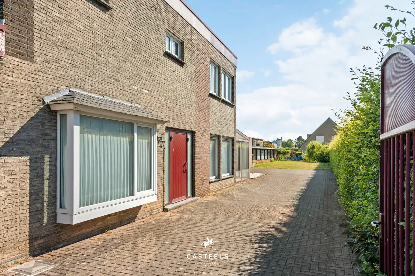 Woning met ruim werkatelier op 1.009 m² in centrum Lochristi foto 3