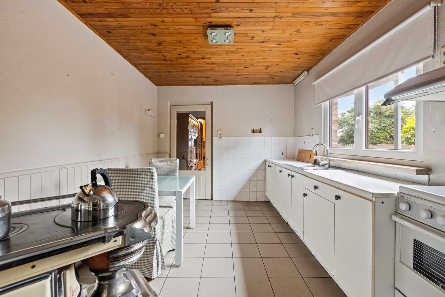 Halfopen woning met veel potentieel op een ruim perceel in Kotem/Maasmechelen foto 12