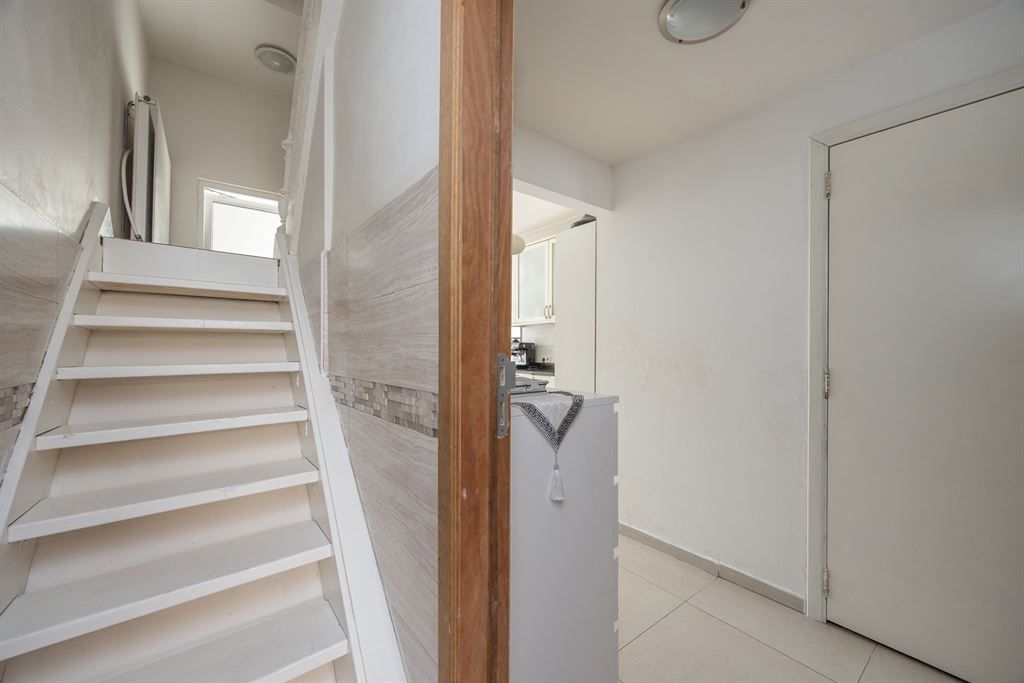 Ruime woning met 4 slaapkamers en stadskoer foto 11