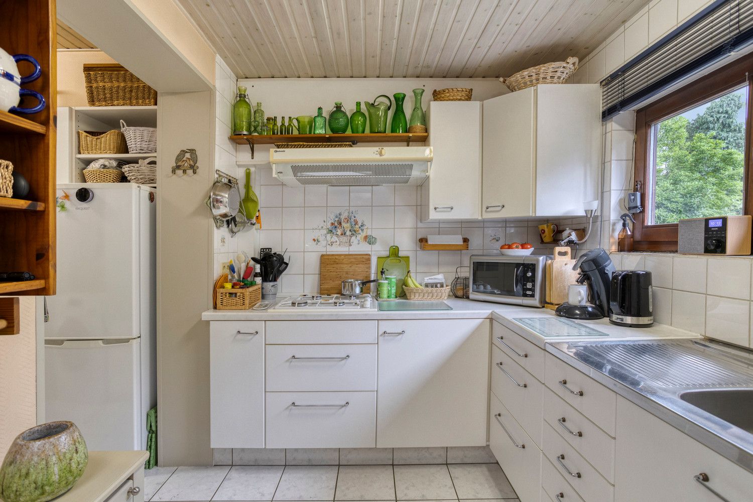 Vlakbij Boekenberg Park gelegen bel-étagewoning met 3 slks, tuin en garage. foto 17