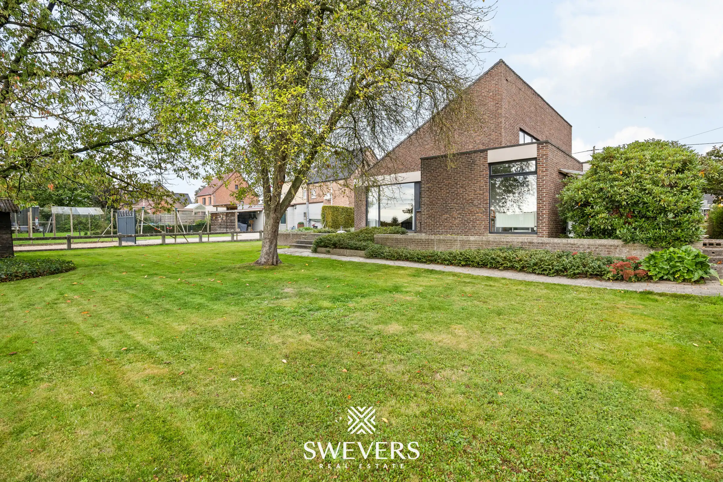 Vrijstaande woning op 13 are met mooie tuin en achterliggende toegang in Alken foto 32