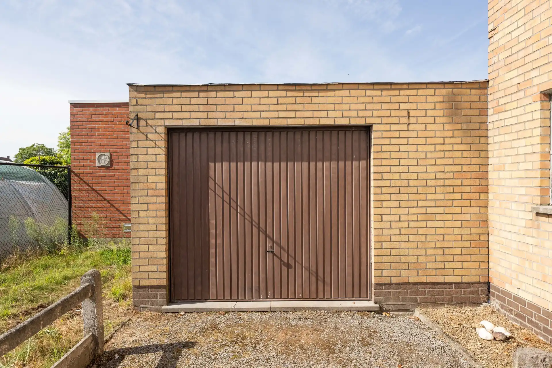 Te renoveren halfopen woning met 3 slaapkamers én zuidwestgerichte tuin met een aparte garage en aansluitende berging in een rustige tuinwijk te koop in Zulte. foto 25