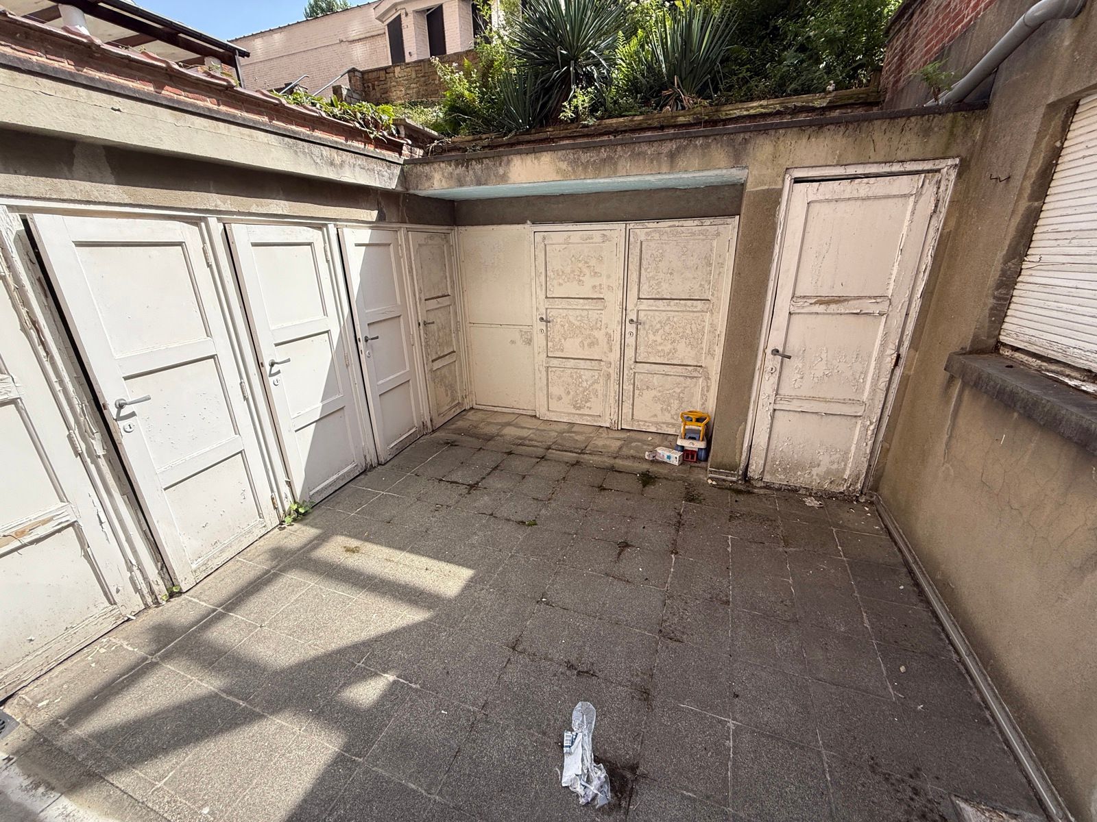 Te renoveren gelijkvloers appartement met 2 slaapkamers foto 10