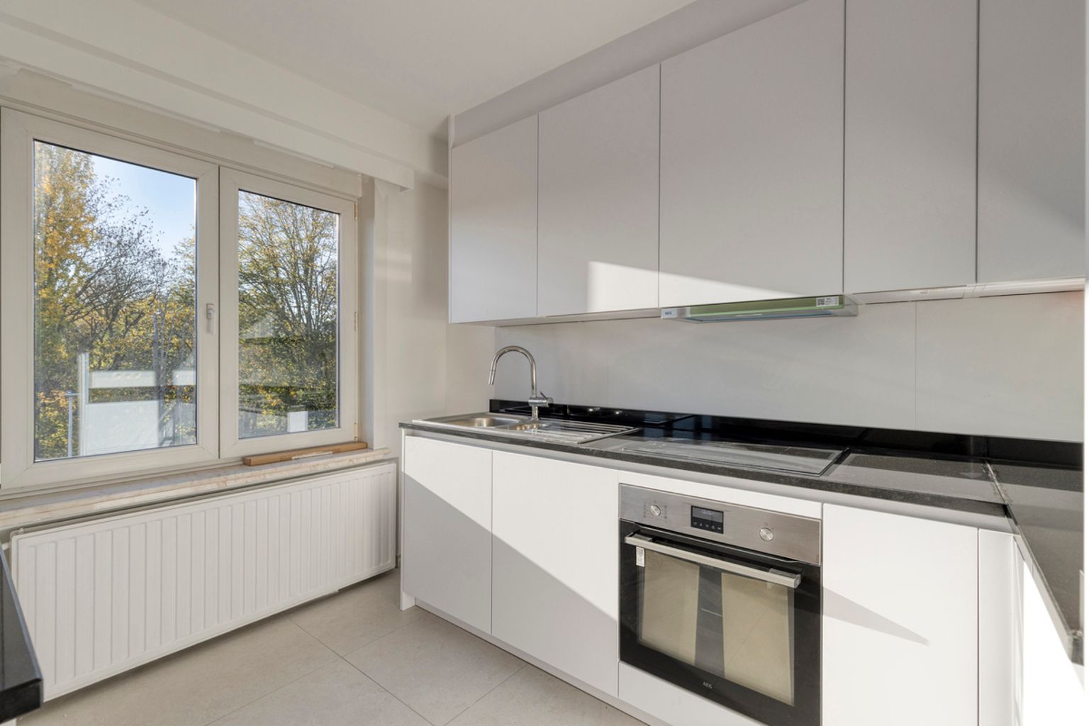 Volledig gerenoveerd en instapklaar 2 slaapkamer appartement foto 9