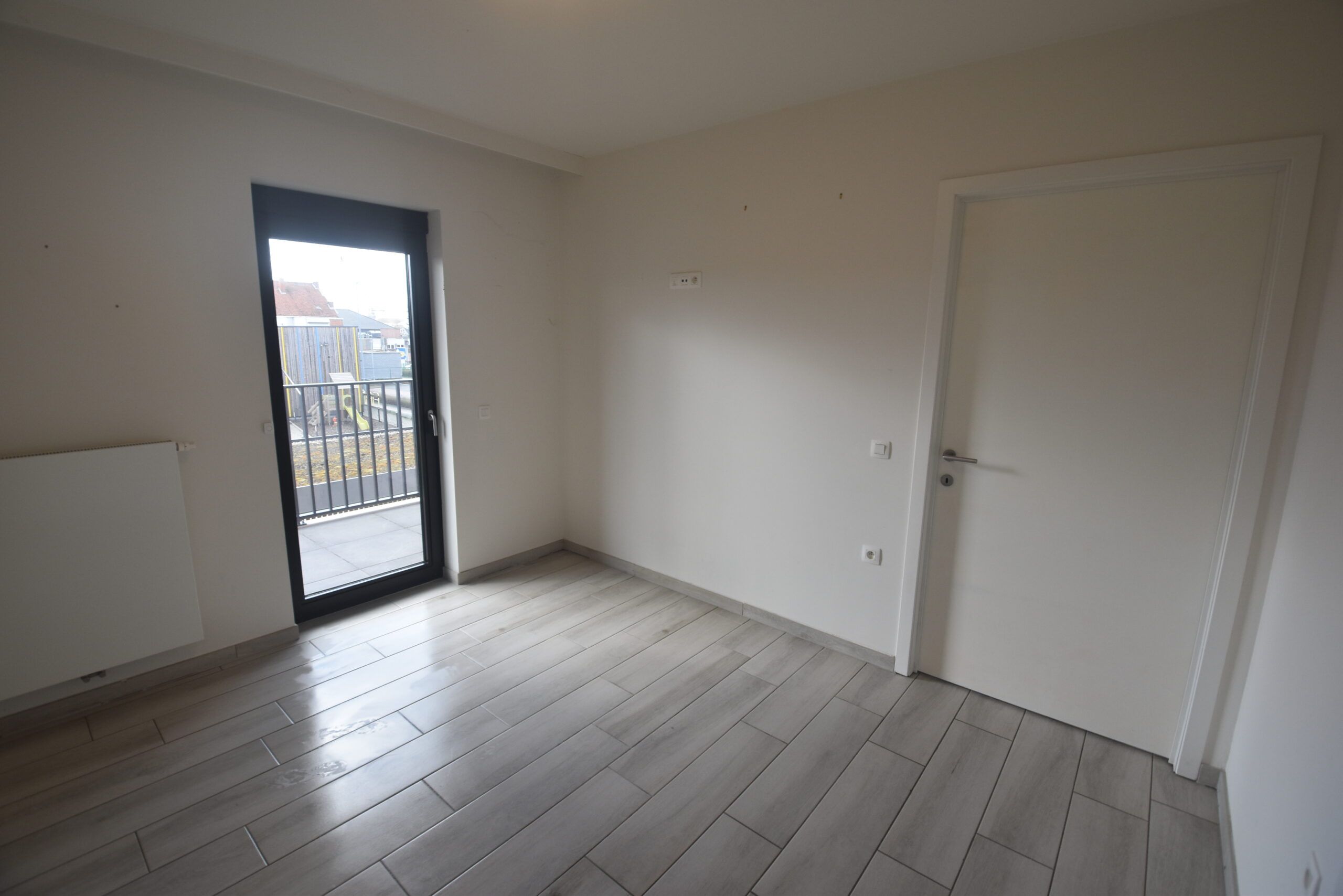 Assistentiewoning met 1 slaapkamer, berging en autostaanplaats in Sint-Niklaas foto 8
