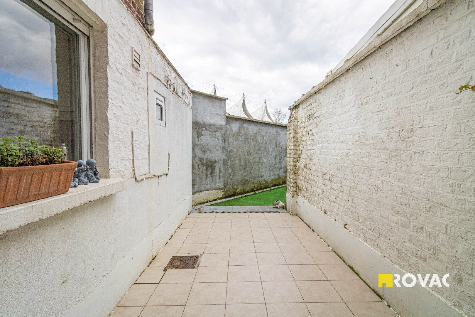 Rijwoning met 3 slaapkamers en koer foto 11
