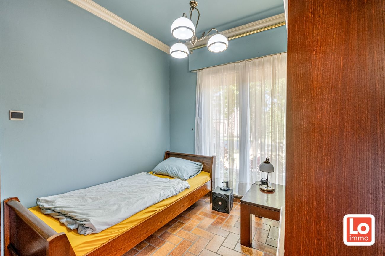 Ruime te renoveren open villa met inpandige garage op een héél rustige toplocatie met open zicht in Lochristi! foto 4