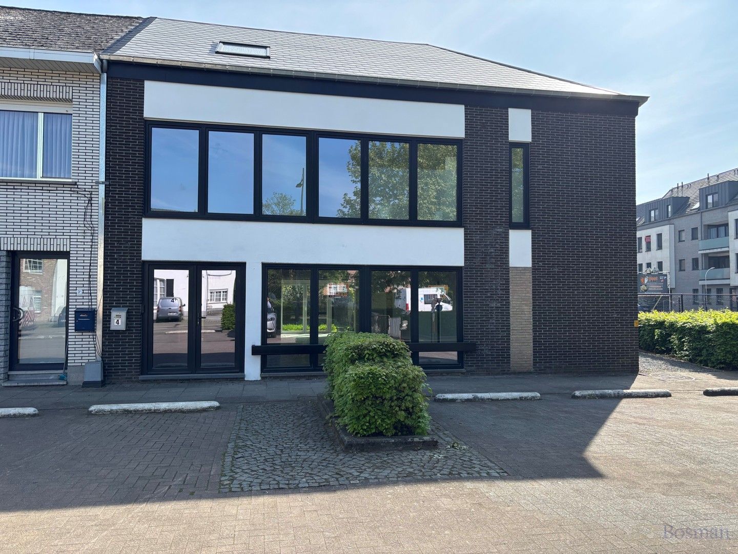Handelspand met woonst te koop in Laakdal centrum foto 30