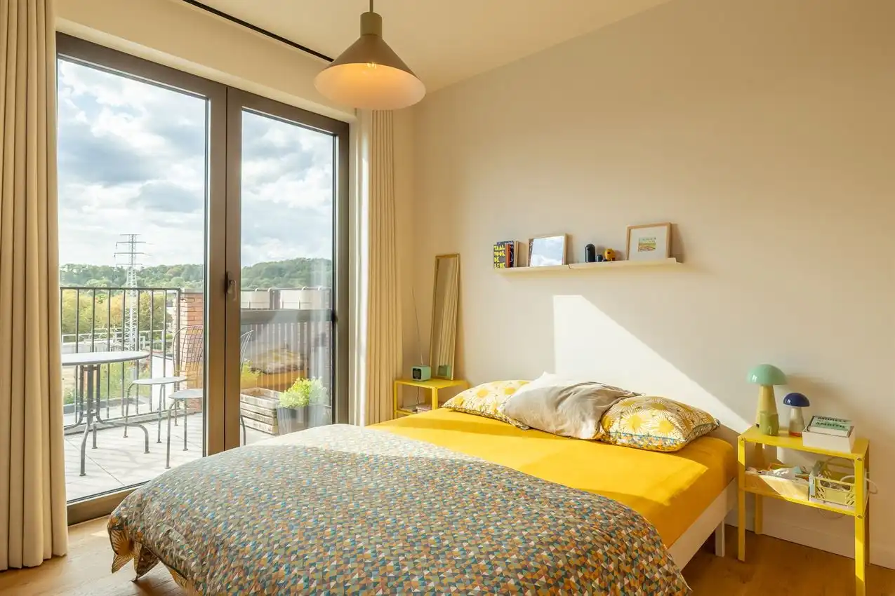 Lichtrijke penthouse met 2 slpk, terras en autostaanplaats foto 9