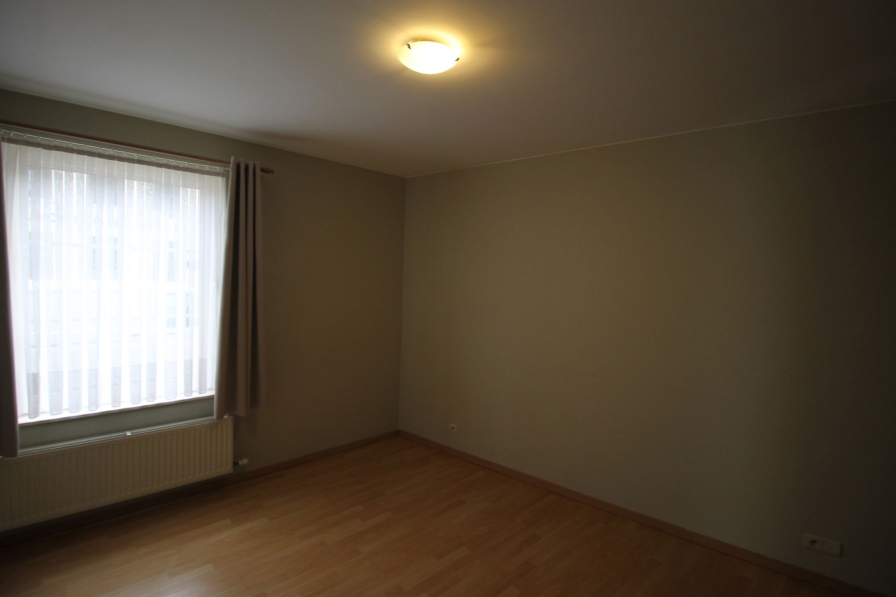 Een gezellig appartement op benedenverdieping vooraan - met garage foto 7