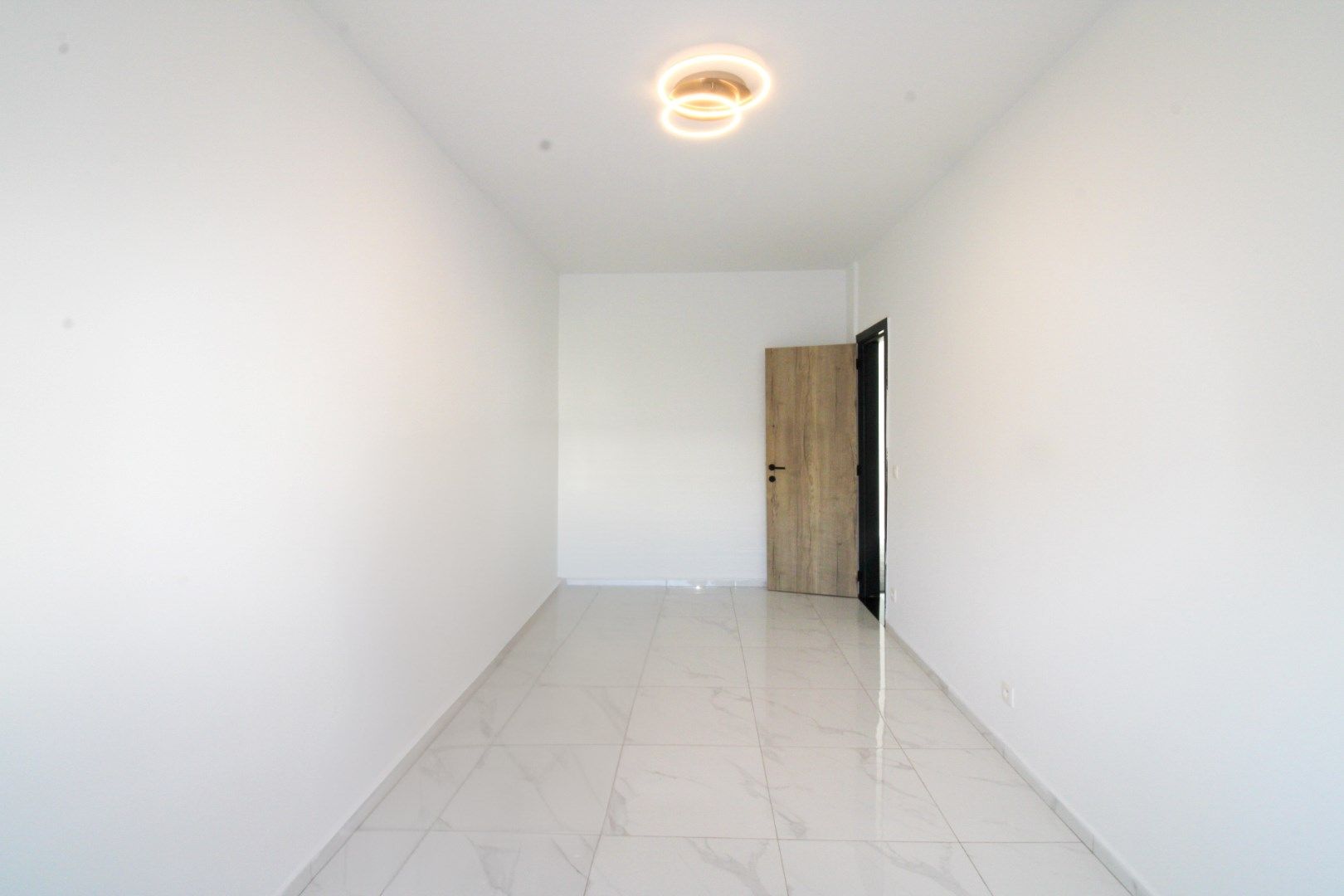 Instapklaar wonen in Schoten: moderne woning met 3 slaapkamers, tuin en inpandige garage te koop! foto 3