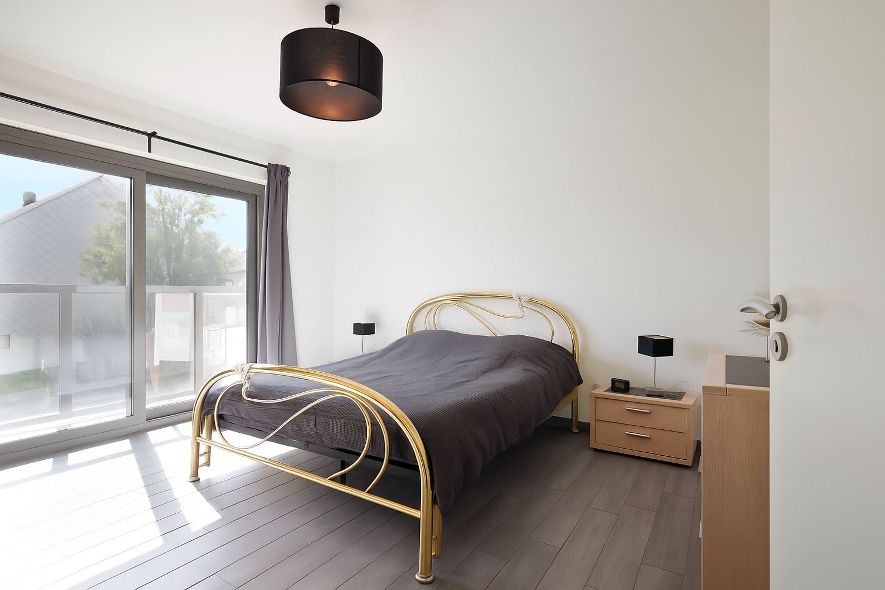 Klassevol 2 slaapkamerappartement met garage foto 11