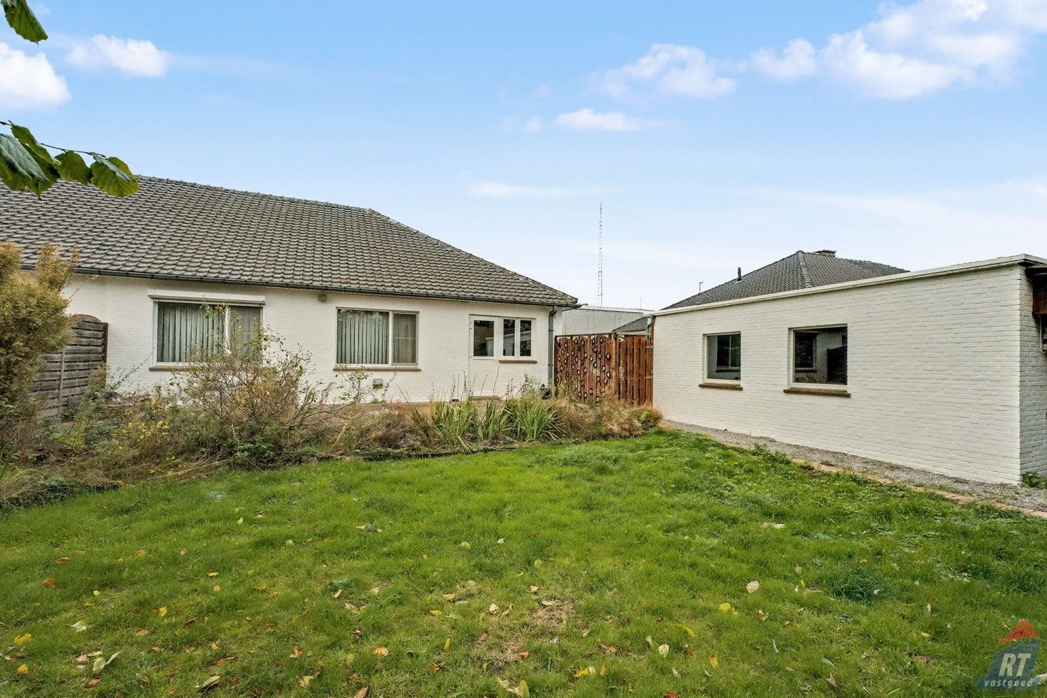 Gelijkvloerse halfopen woning met tuin en renovatiepotentieel in het hart van Sint-Truiden foto 18