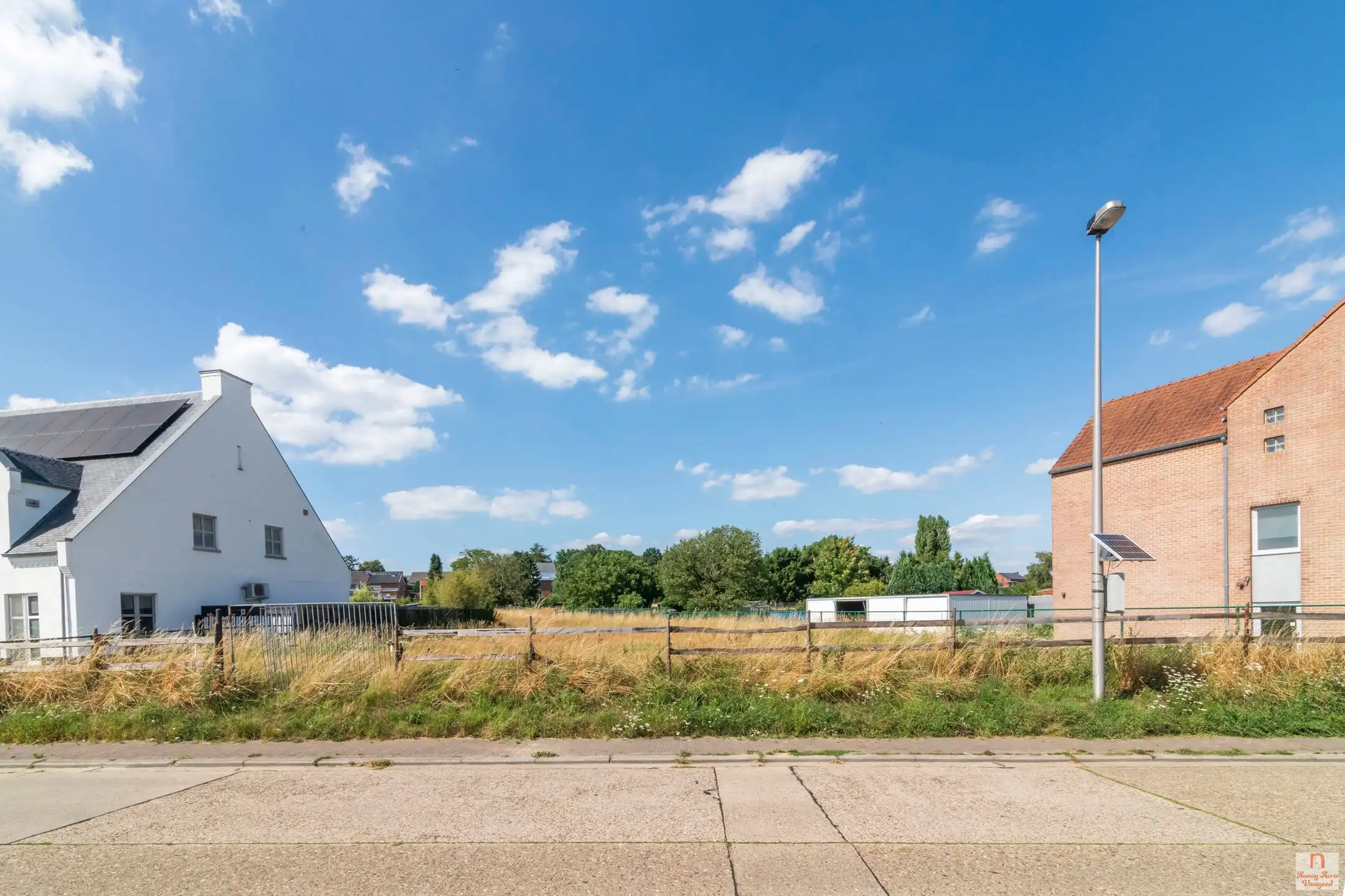 Ruim perceel voor open bebouwing in Lanaken foto {{pictureIndex}}