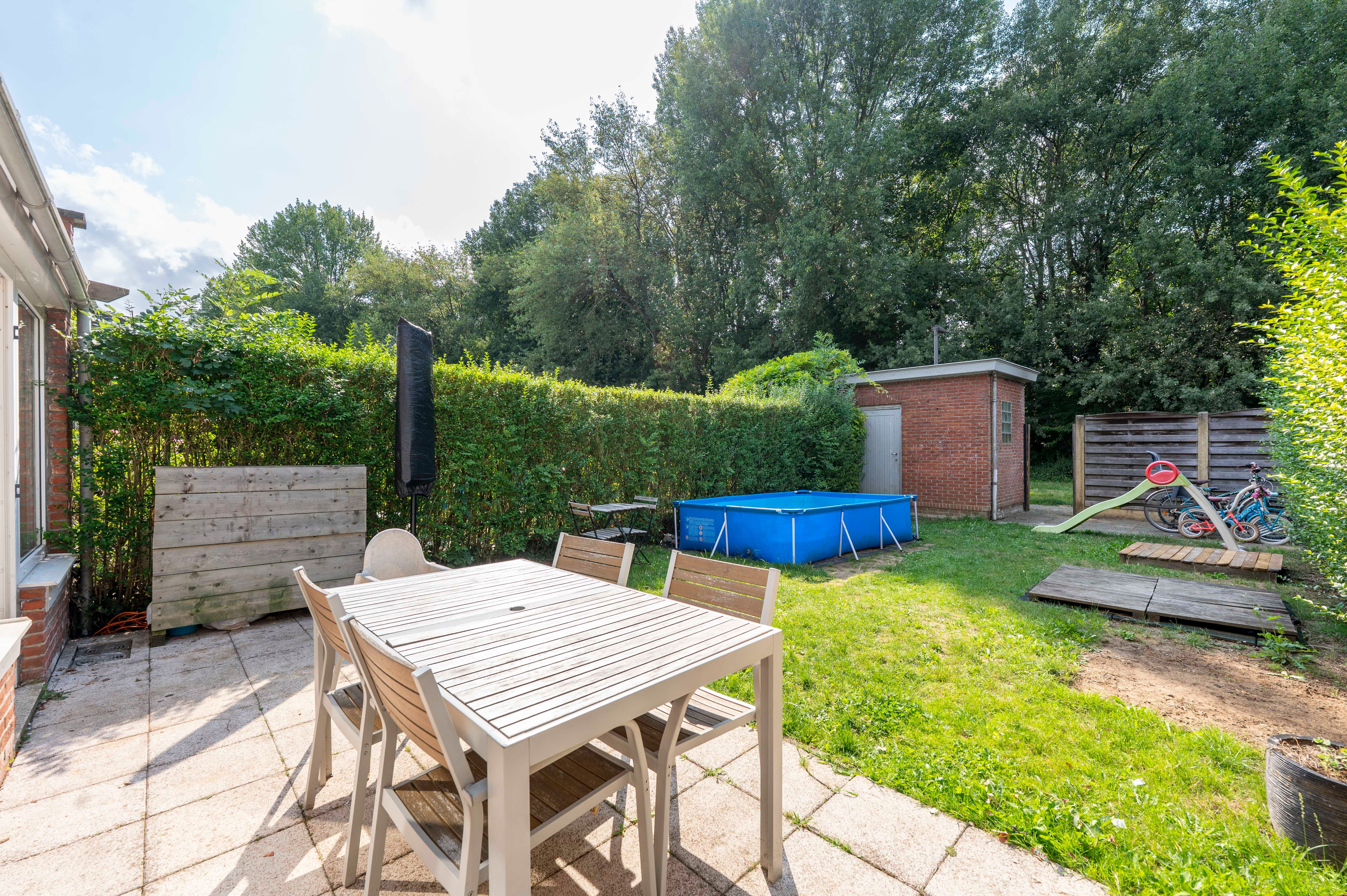 Instapklare gezinswoning met tuin en achteringang op centrale locatie in Ekeren! foto 15