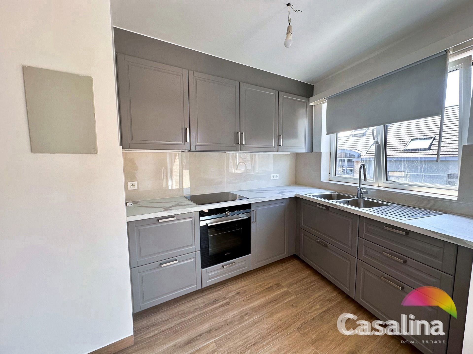 Gemengd gebouw bestaande uit 2 handelsruimtes en 4 woonunits foto 17