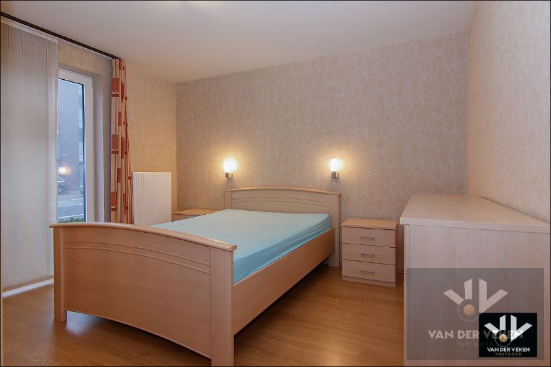Zeer ruim, lichtrijk en instapklaar gelijkvloers appartement met tuin en gedeeltelijk overdekt terras in het centrum van Kortessem foto 5