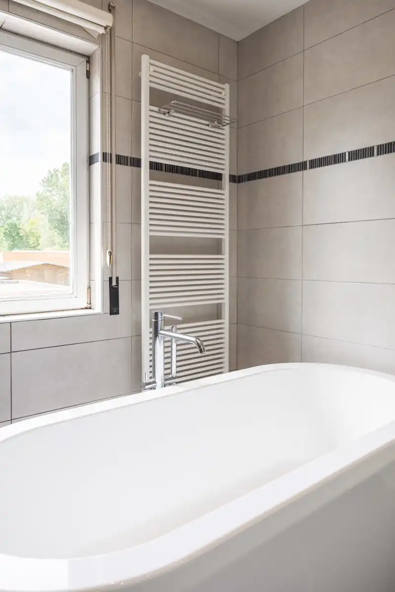 Energiezuinige, uitstekend onderhouden woning met mooie tuin foto 17