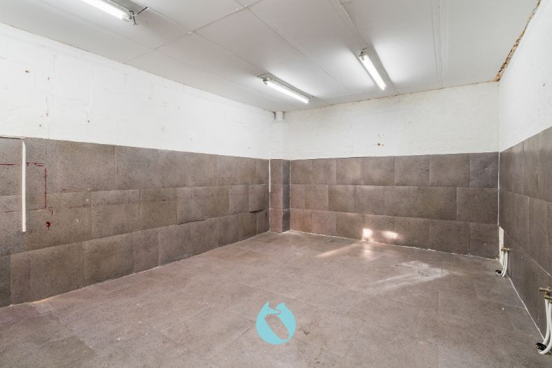 Woning met handels- of praktijkruimte foto 15