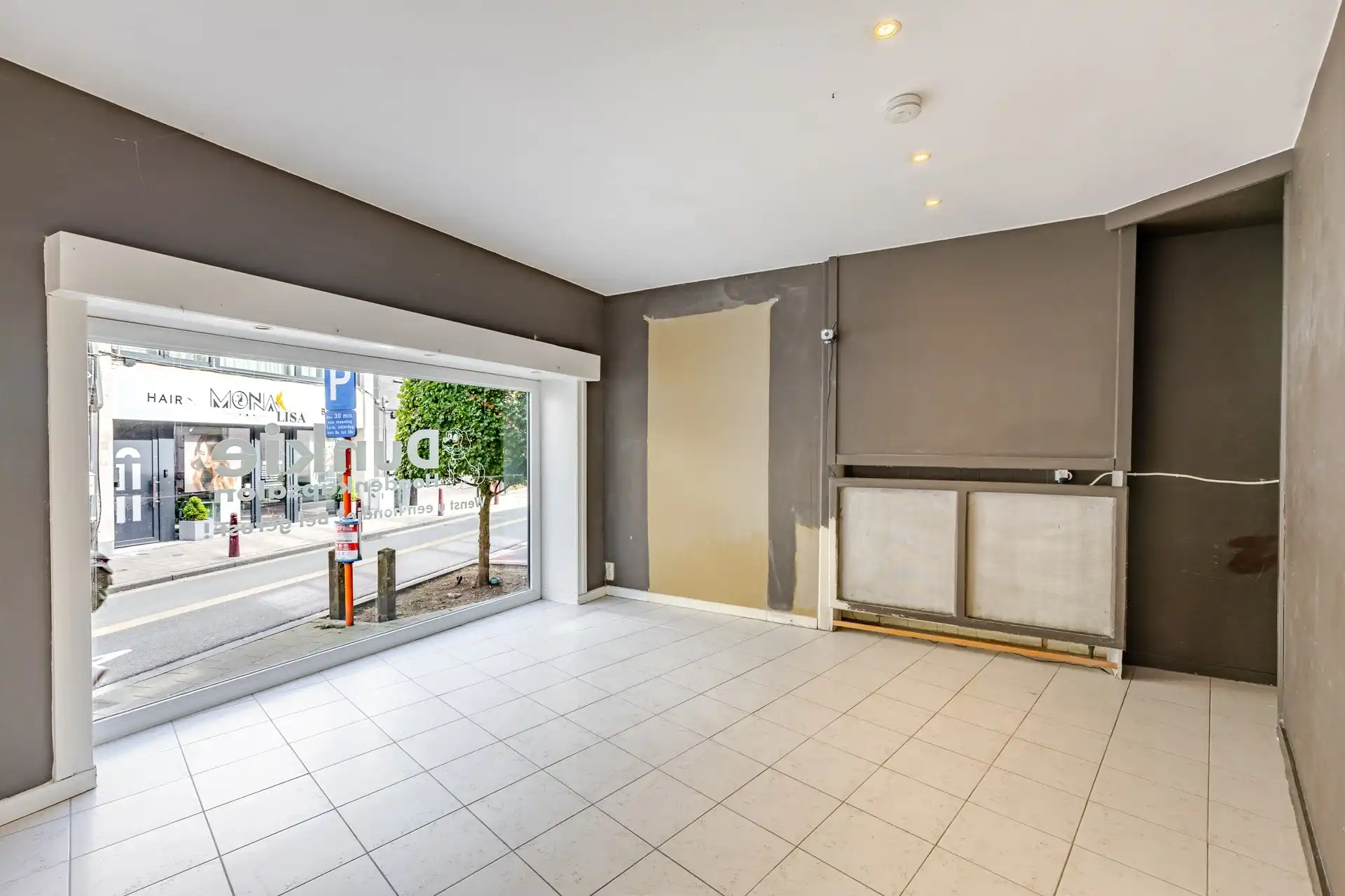 Handelspand met uitstekende visibiliteit en tal van mogelijkheden nabij het centrum van Aalst foto 10