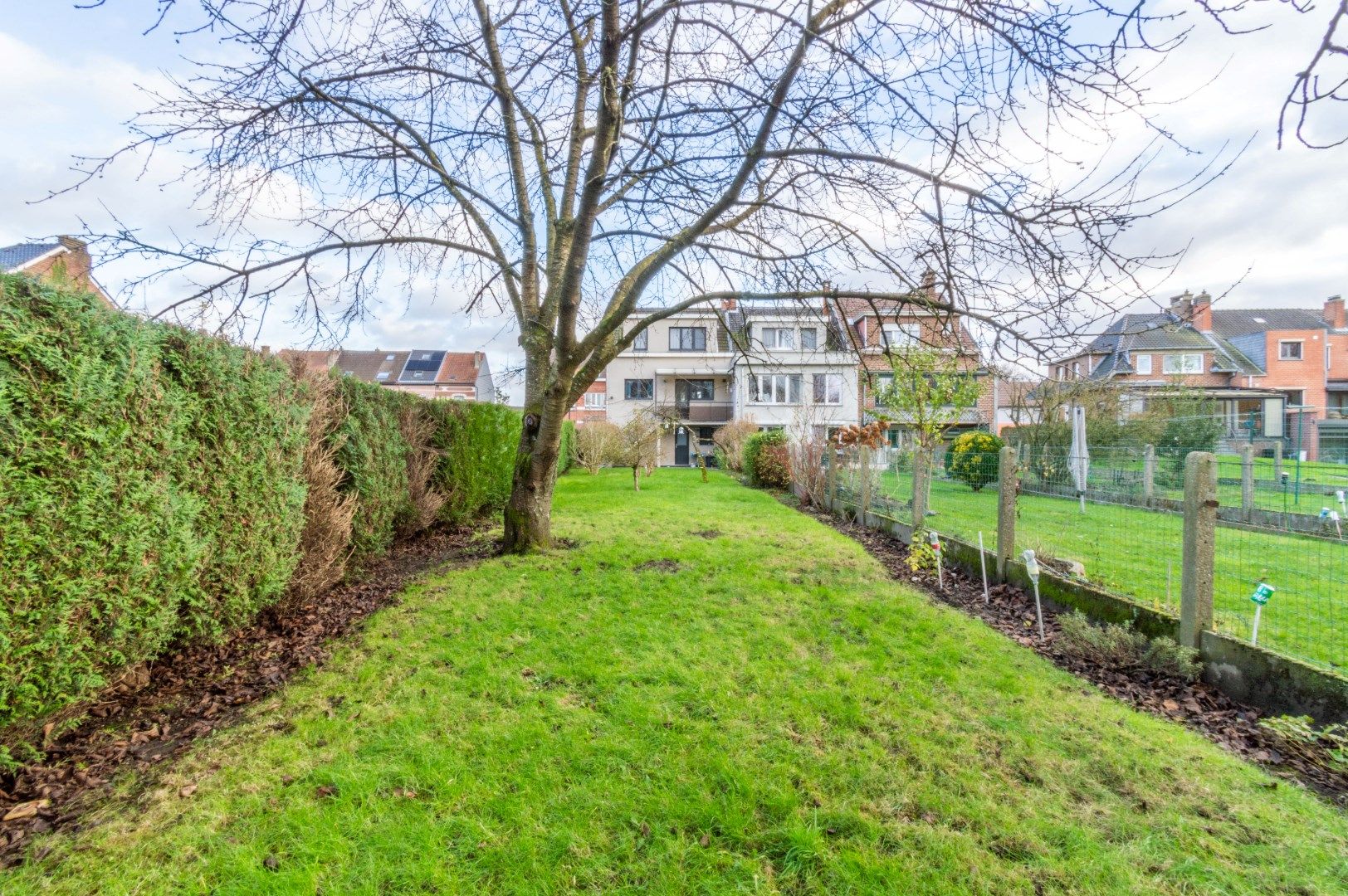 Solide en energiezuinige 3-gevel woning met aangename tuin! foto 9