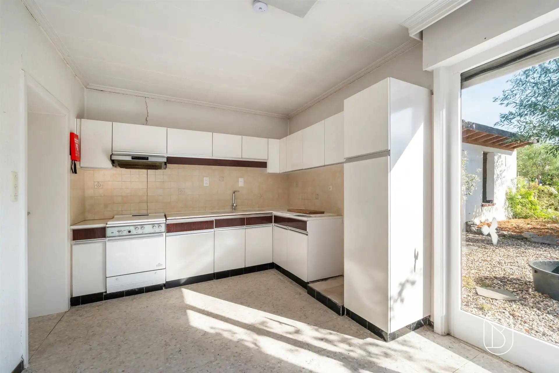 Ruime woning met werkplaats van 200 m² en diepe tuin foto 12