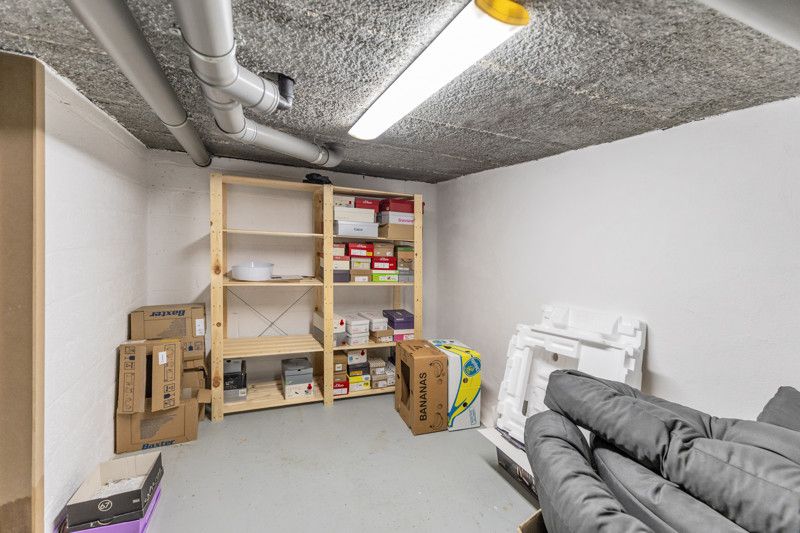 Trendy en energiezuinig appartement met 2 slaapkamers, terras, berging en carport foto 21