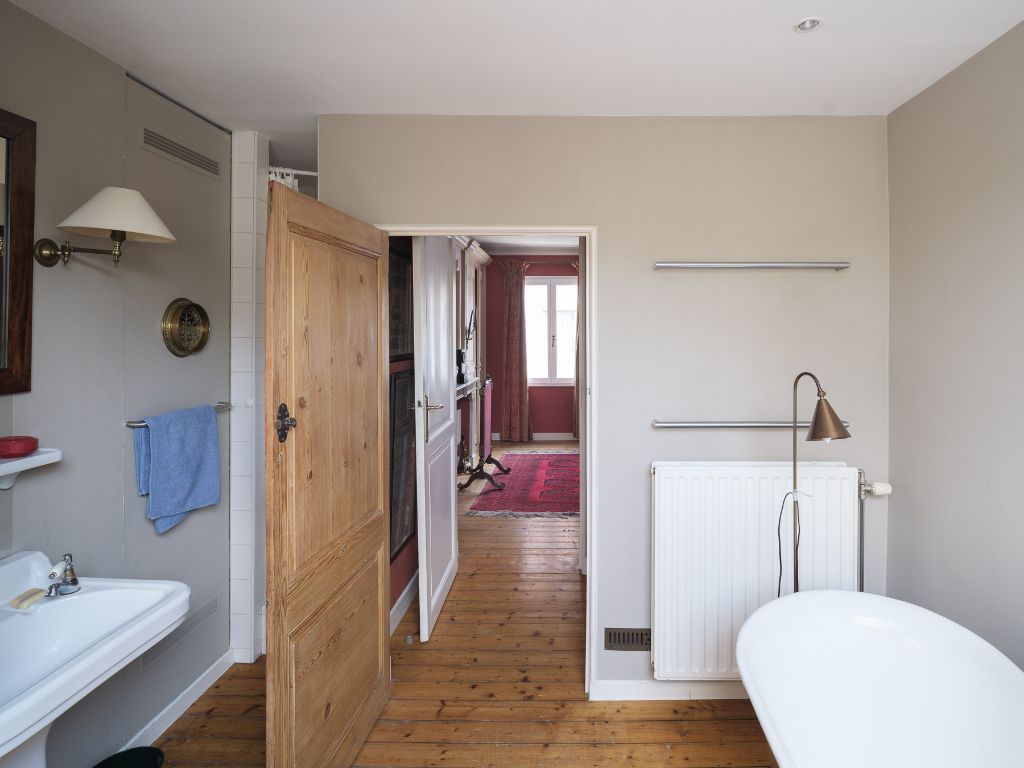 Karaktervolle burgerwoning met drie slaapkamers en een aangename, groene tuin op een uitstekende locatie in Gent. foto 18