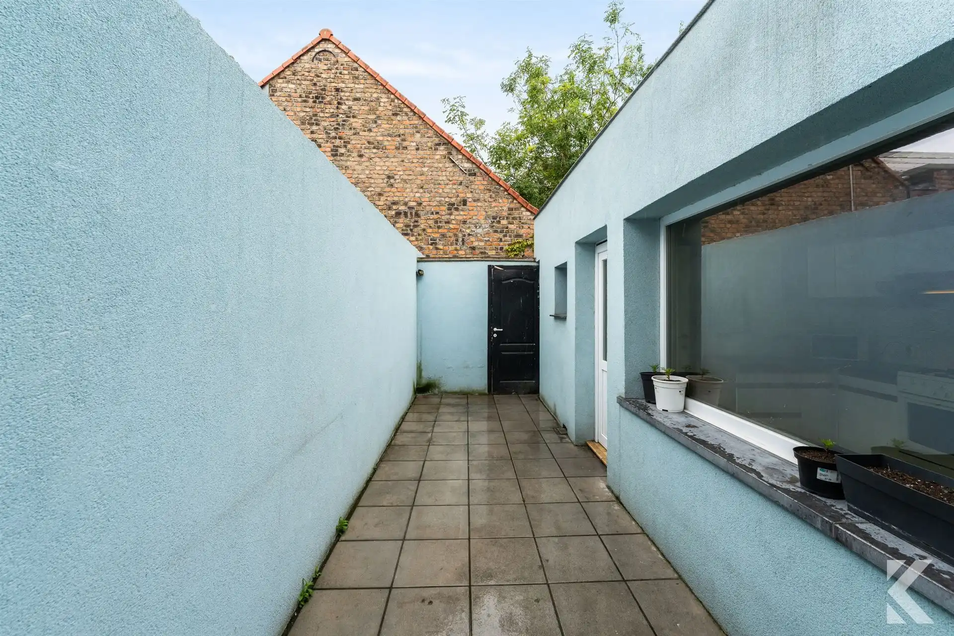 Volledig gerenoveerde woning met 3 slpk, 2 bdk,zonnige koer foto 8
