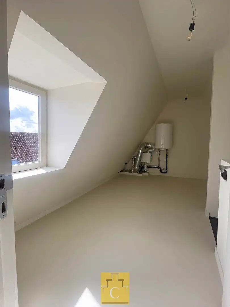 hippe eigentijds gerenoveerde hoekwoning met 2 garages en zonnige stadstuin in de gegeerde Sint-Annawijk foto 23