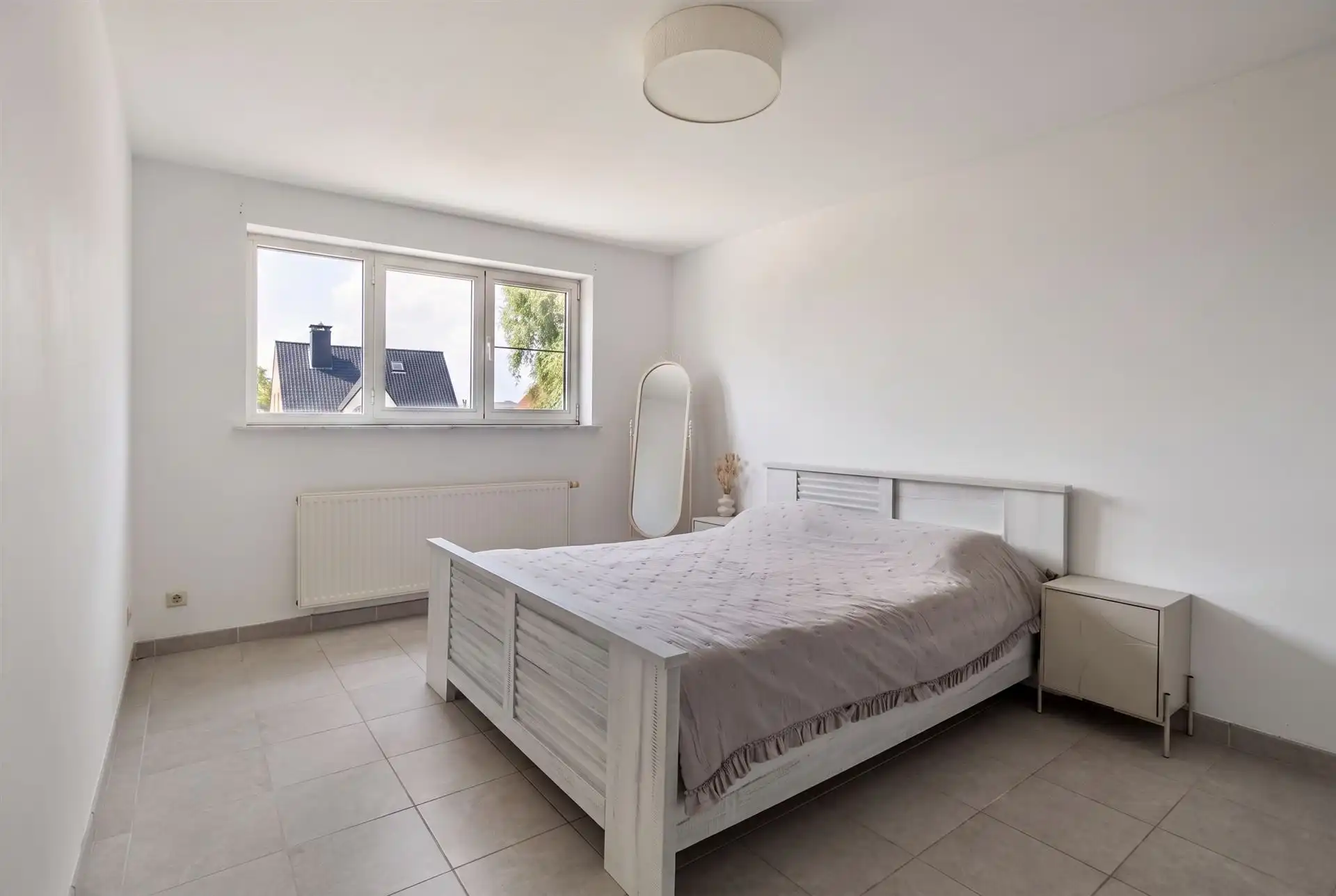 Instapklare woning met 3 slaapkamers en garage.  foto 12