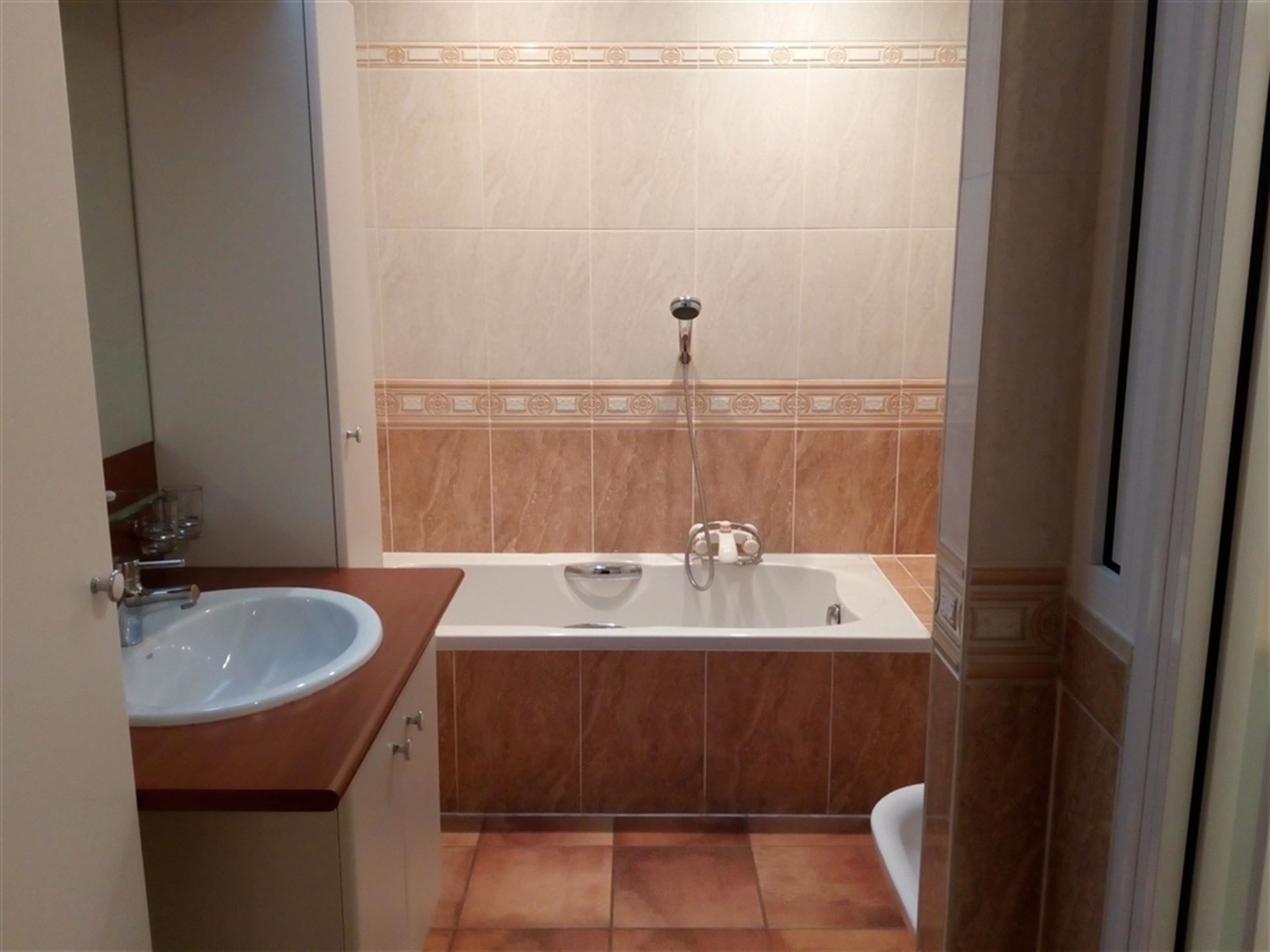 Appartement op eerste verdieping in centrum van Lummen! foto 10