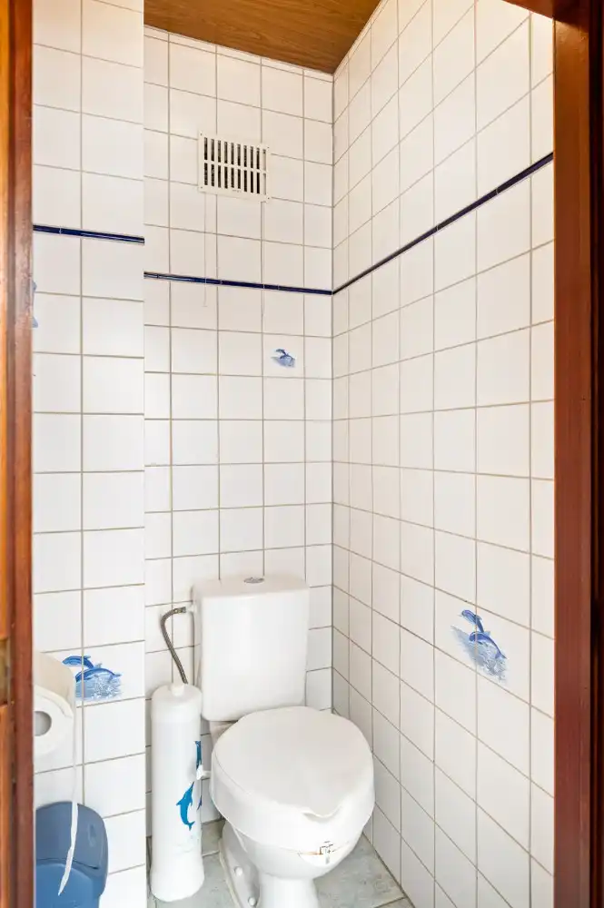 Vrijstaande, te renoveren woning met 3 à 4 slpk., garage en zuid-tuin foto 15