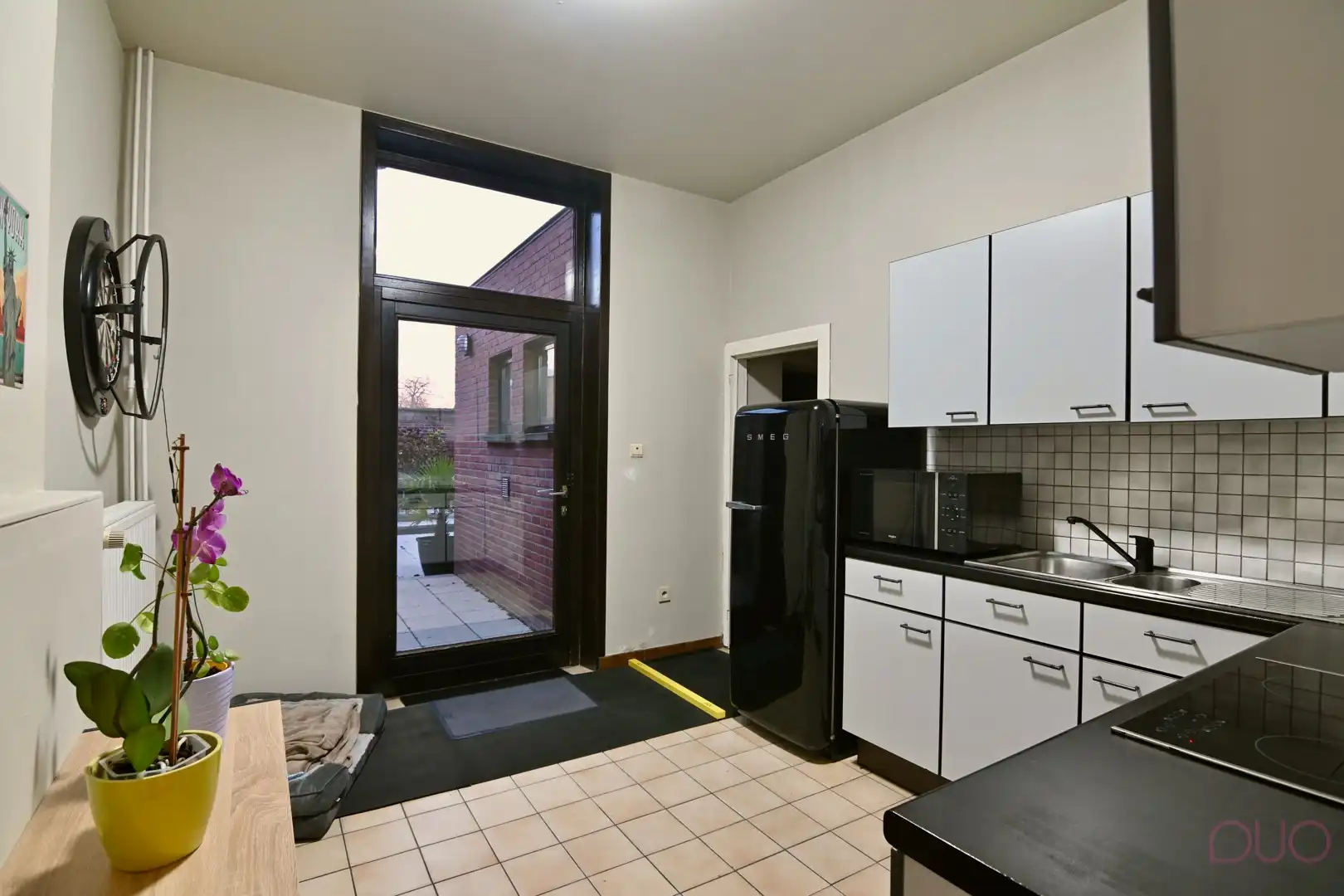 Instapklare woning in hartje Sint-Truiden met gezellige stadstuin en garage foto 7