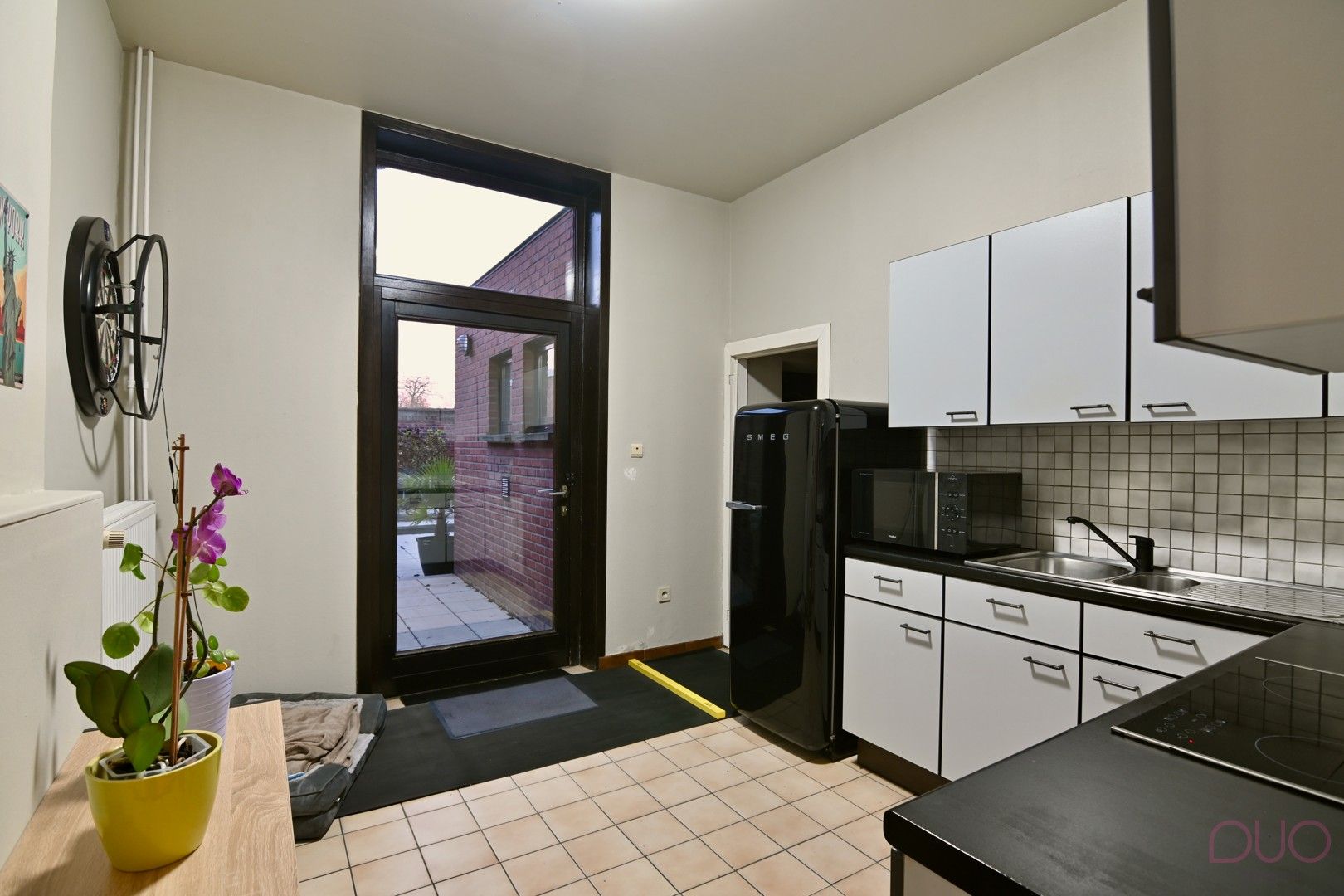 Instapklare woning in hartje Sint-Truiden met gezellige stadstuin en garage foto 7