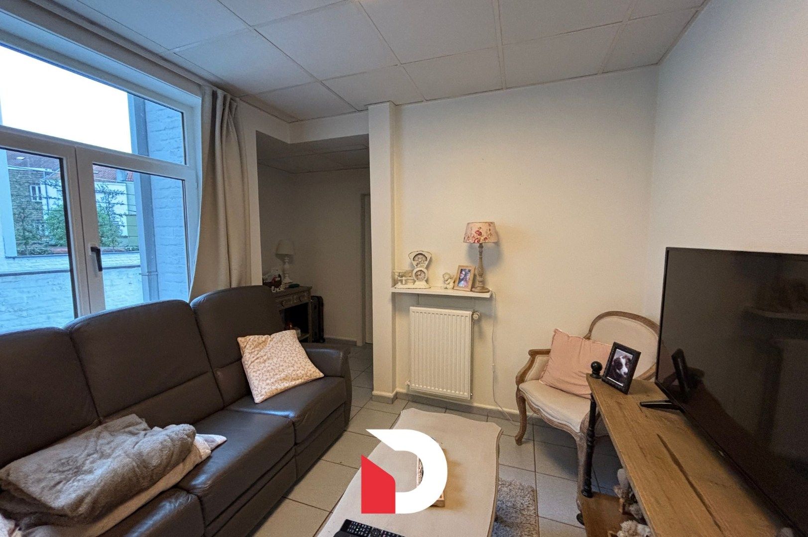 Rustig gelegen 1 slaapkamer appartementje met koer foto 2