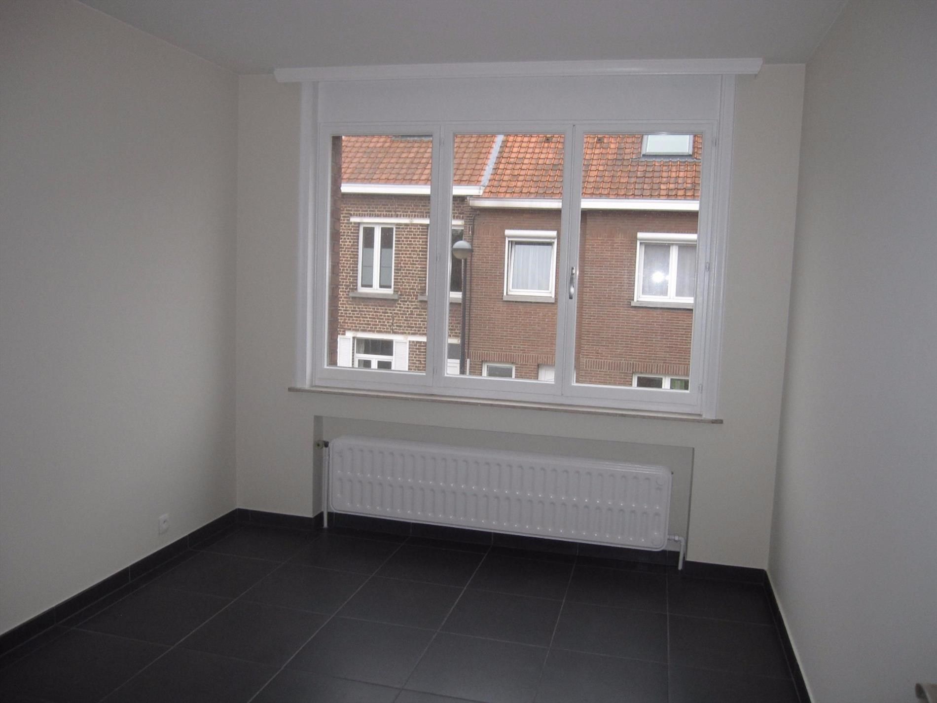 Ruim hoekappartement met garage foto 7