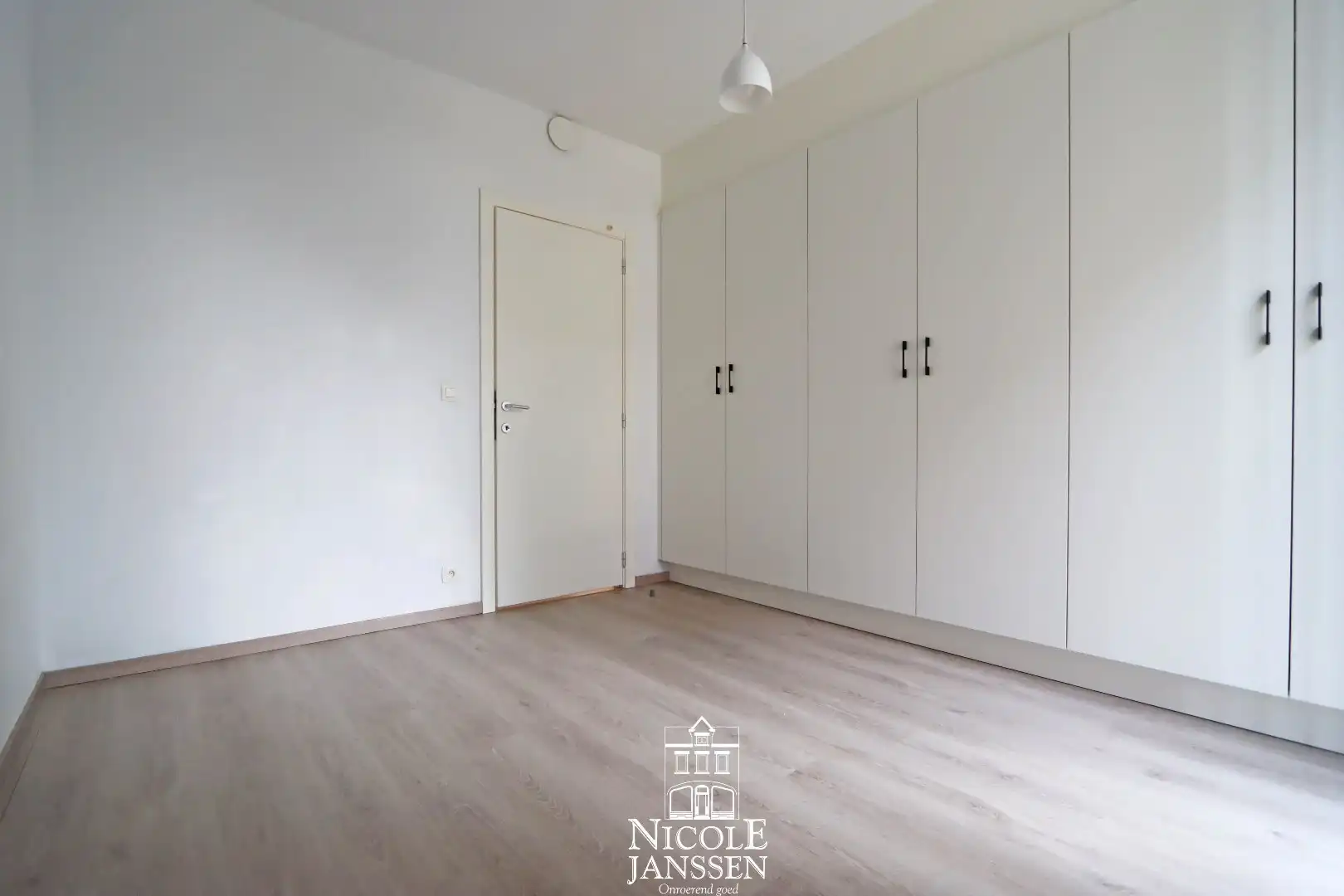 Gelijkvloers appartement met 2 slaapkamers, kelderberging en autostandplaats foto 8