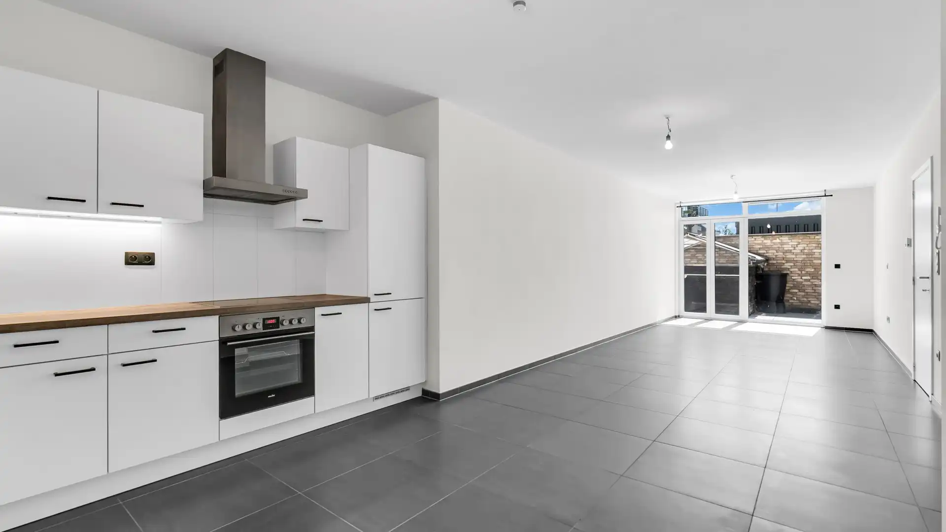 Energiezuinig gelijkvloers appartement met een ruim terras te Maasmechelen foto 4