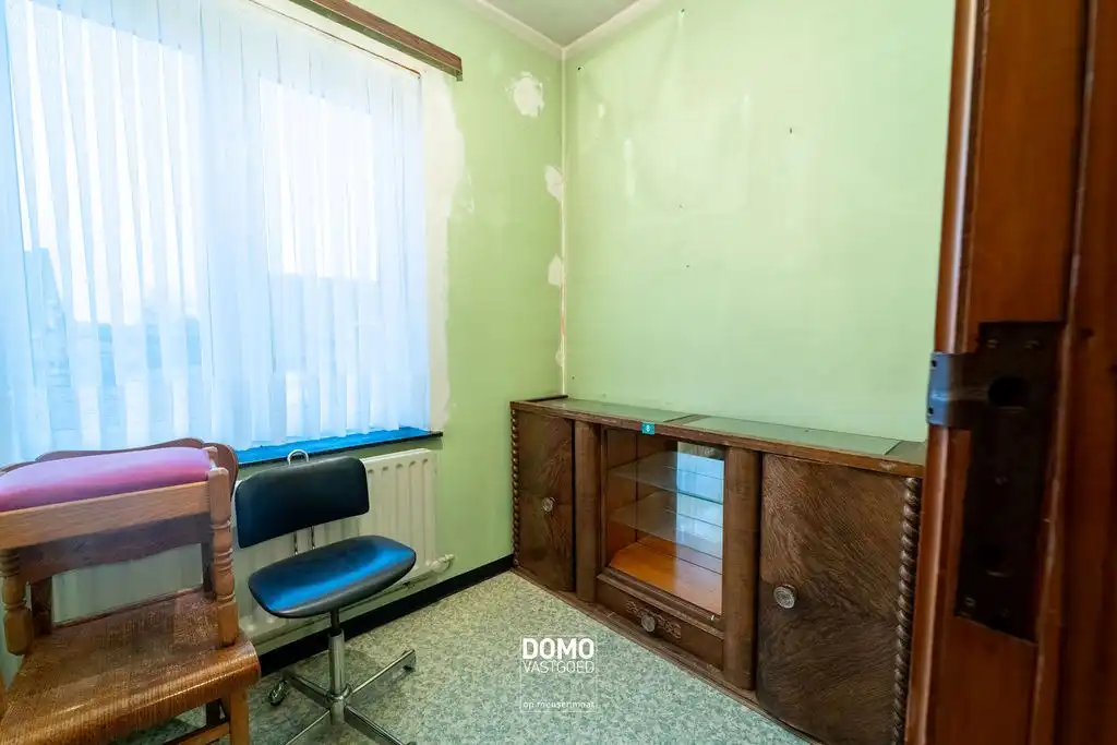 Halfopen bebouwing met grote tuin en 3 slaapkamers foto 12