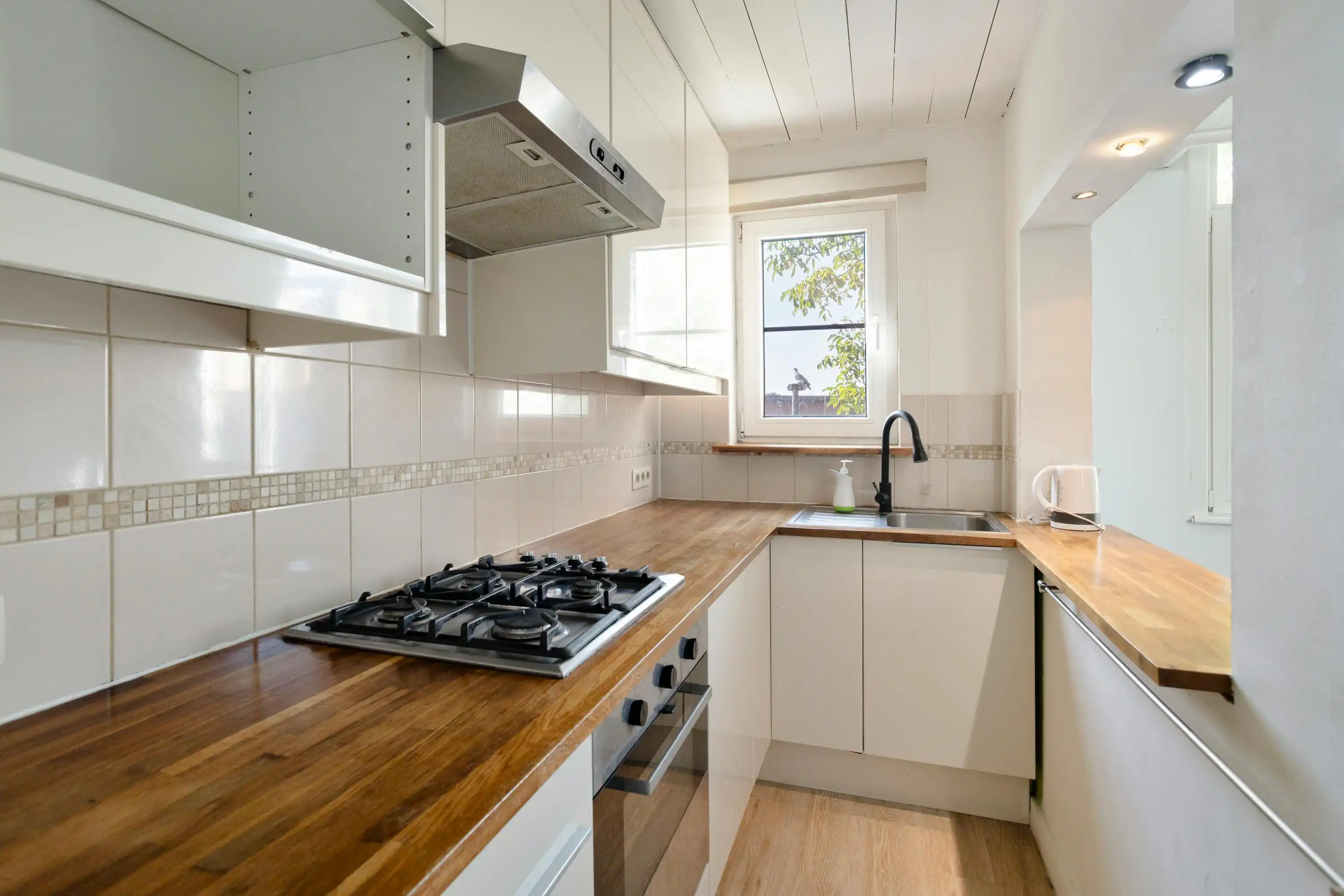 Huis met twee slaapkamers en terras te koop in Deurne! foto 8