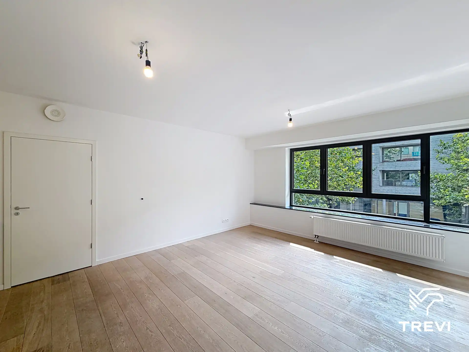 EUROPESE WIJK – Mooi 1-slaapkamerappartement met parking! foto 3
