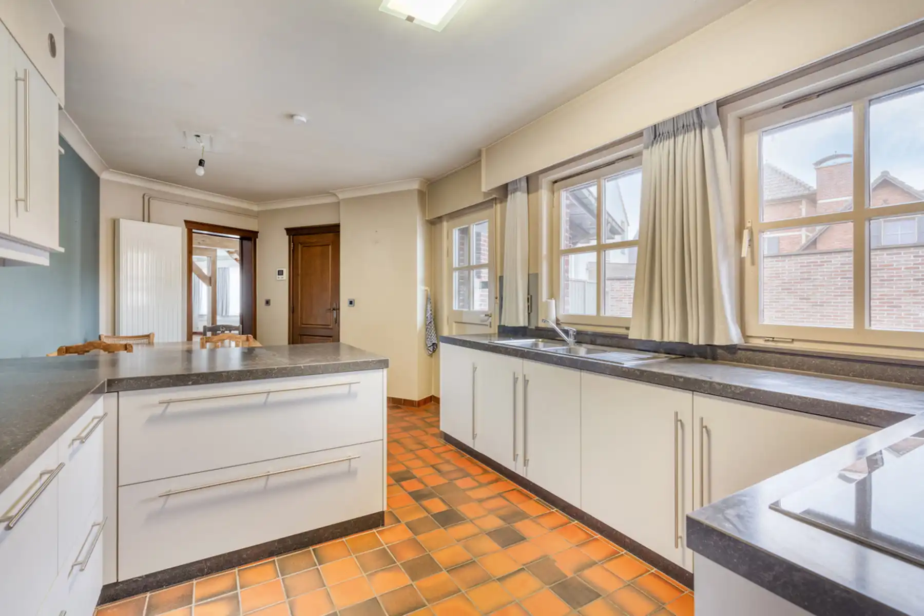 Woning met atelier en 4 slaapkamers in Buggenhout foto 14