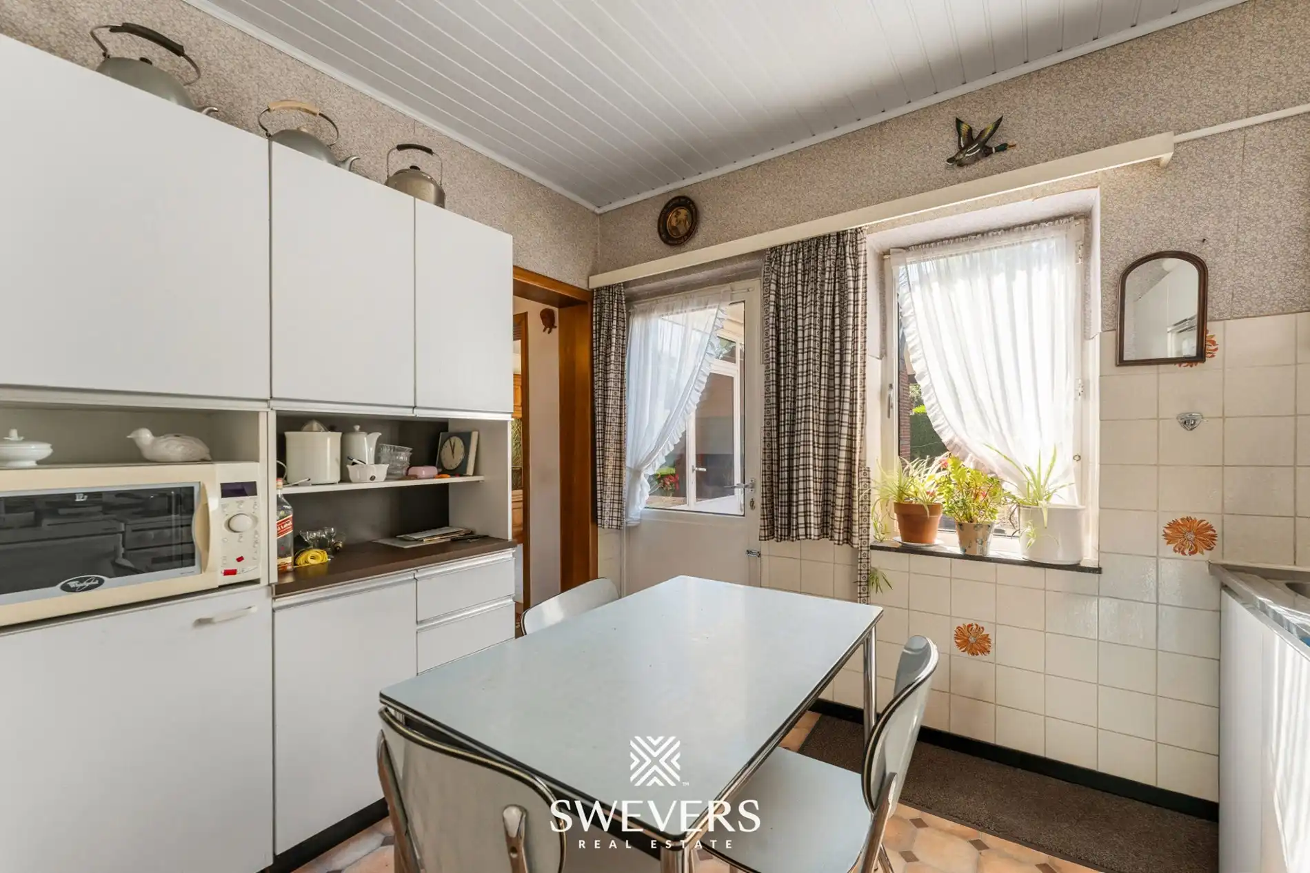 Te renoveren woning met grote tuin en 5 slaapkamers in Genk foto 10