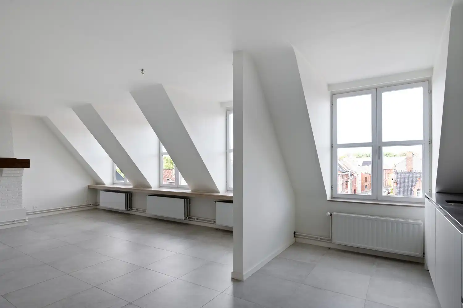 Lichtrijk, instapklaar dakappartement met 2 slaapkamers nabij het Zimmerplein in Lier! foto 4