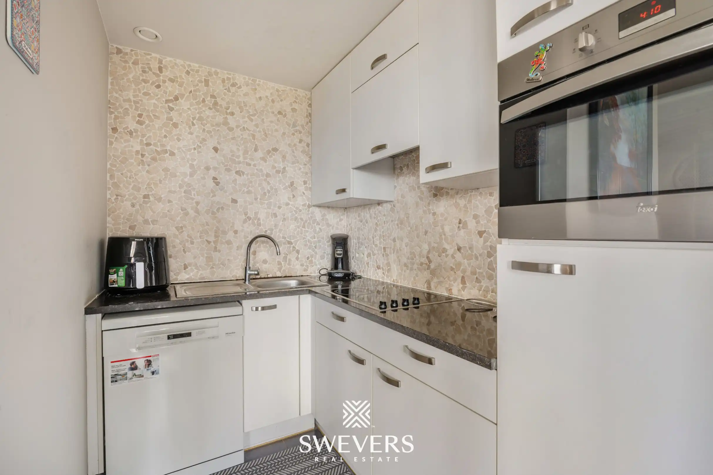 Uitstekend gelegen appartement met 2 slaapkamers en ondergrondse staanplaats foto 8