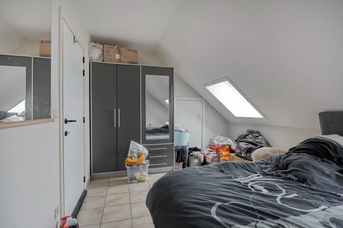 Opbrengsteigendom met 3 appartementen en 7 garages foto 19