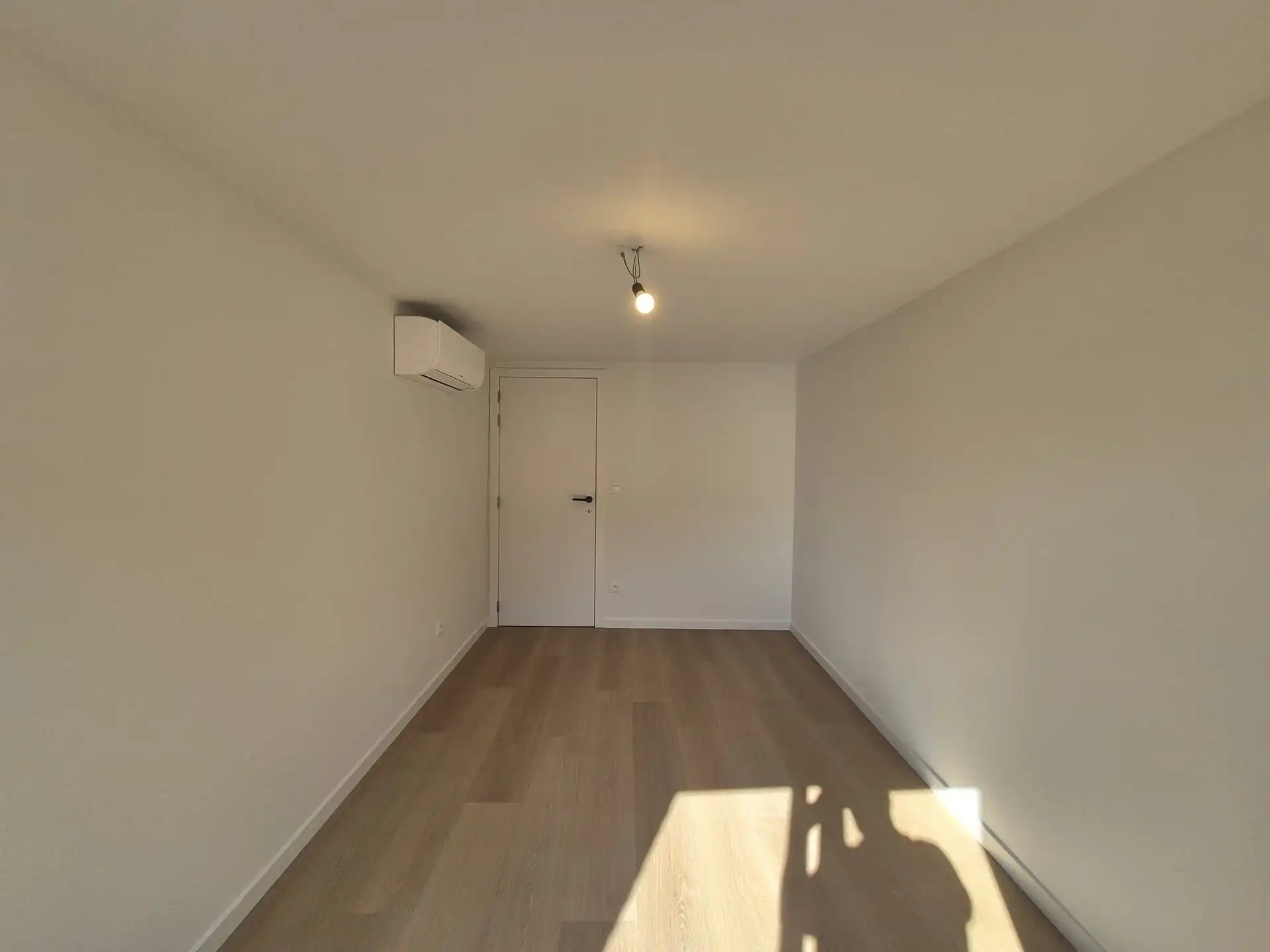 Ruim triplex appartement met polyvalente ruimte op toplocatie in het hart van Wetteren foto 20