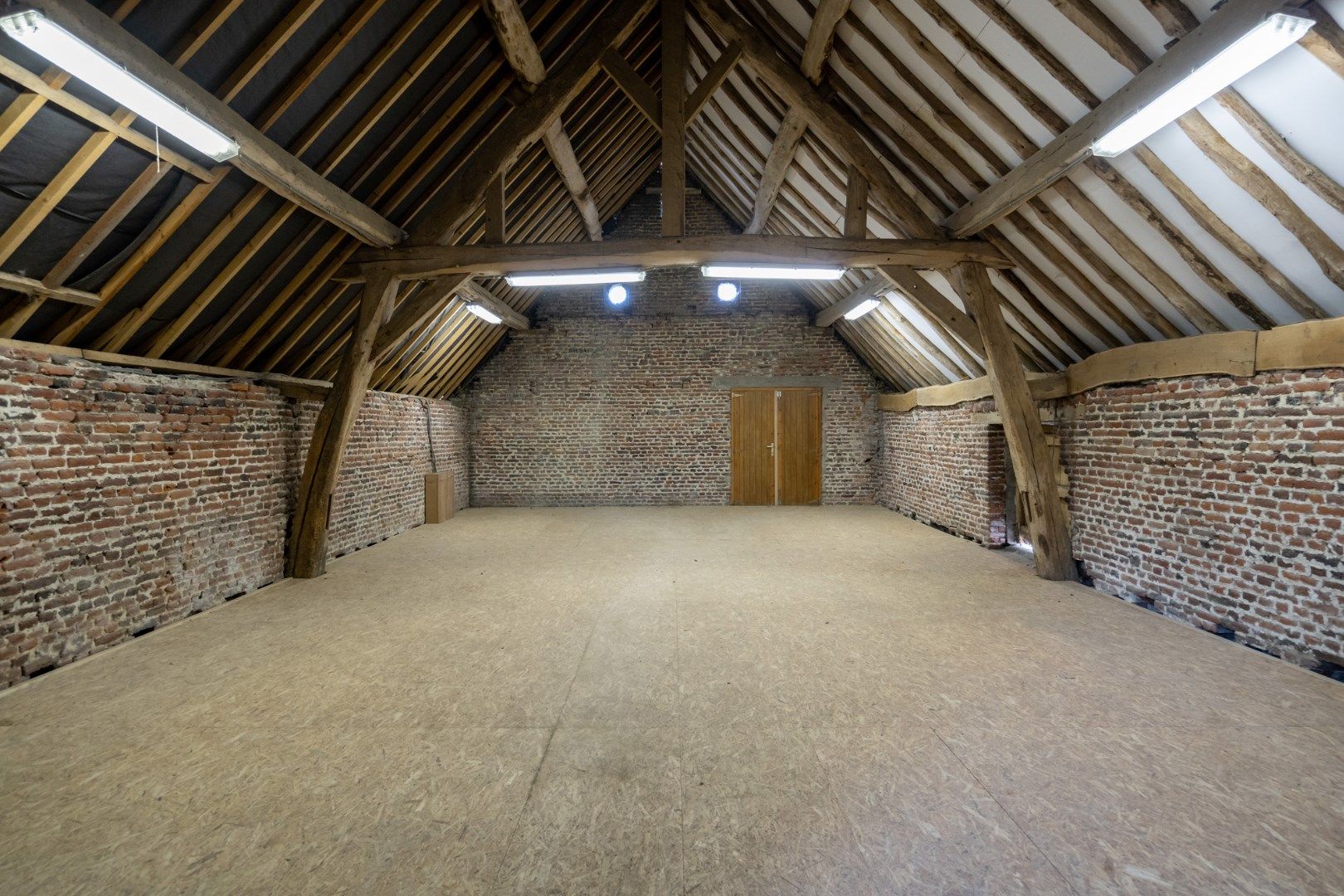  Magazijn deeluitmakende van vierkantshoeve Hof ter Poorten te Althoeselt, met een totale oppervlakte van 445 m² foto 8